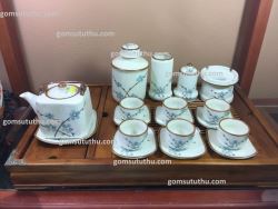 Ấm chén vuông quai đồng đào xanh men sữa